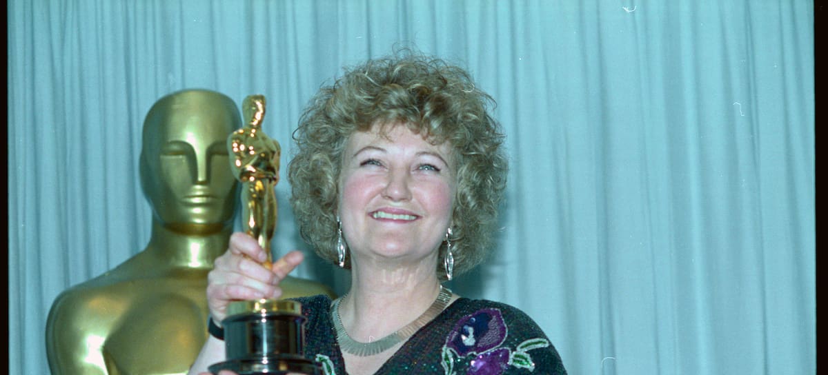 (Original Caption) Academy Awards, Los Angeles - Brenda Fricker holds up her Oscar after winning Best Supporting Actress for her role in My Left Foot March 26 at the 62nd Academy Awards.