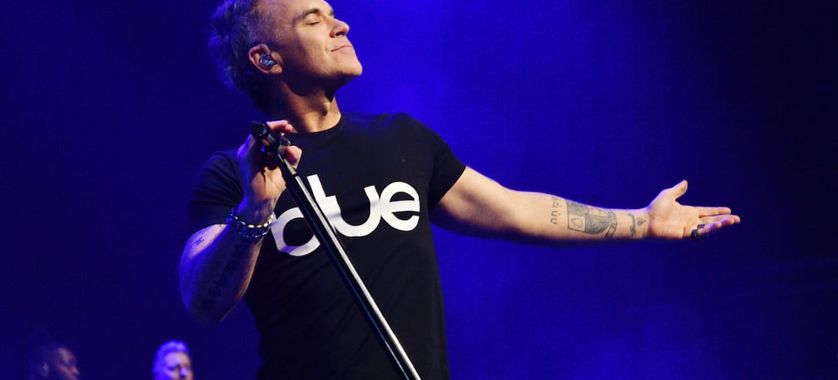 LONDON, ENGLAND - FEBRUARY 08: (EDITORIAL USE ONLY. IMAGES MAY ONLY BE USED IN RELATION TO THE EVENT) Robbie Williams performs onstage during his Long 90's UK Tour at Brixton Academy on February 08, 2026 in London, England. (Photo by Jim Dyson/Getty Images)