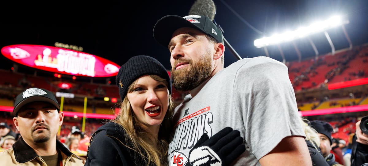 KANSAS CITY, MISSOURI - JANUARY 26: Tight end Travis Kelce #87 of the Kansas City Chiefs celebrates with Taylor Swift after the AFC Championship football game against the Buffalo Bills, at GEHA Field at Arrowhead Stadium on January 26, 2025 in Kansas City, Missouri. (Photo by Brooke Sutton/Getty Images)