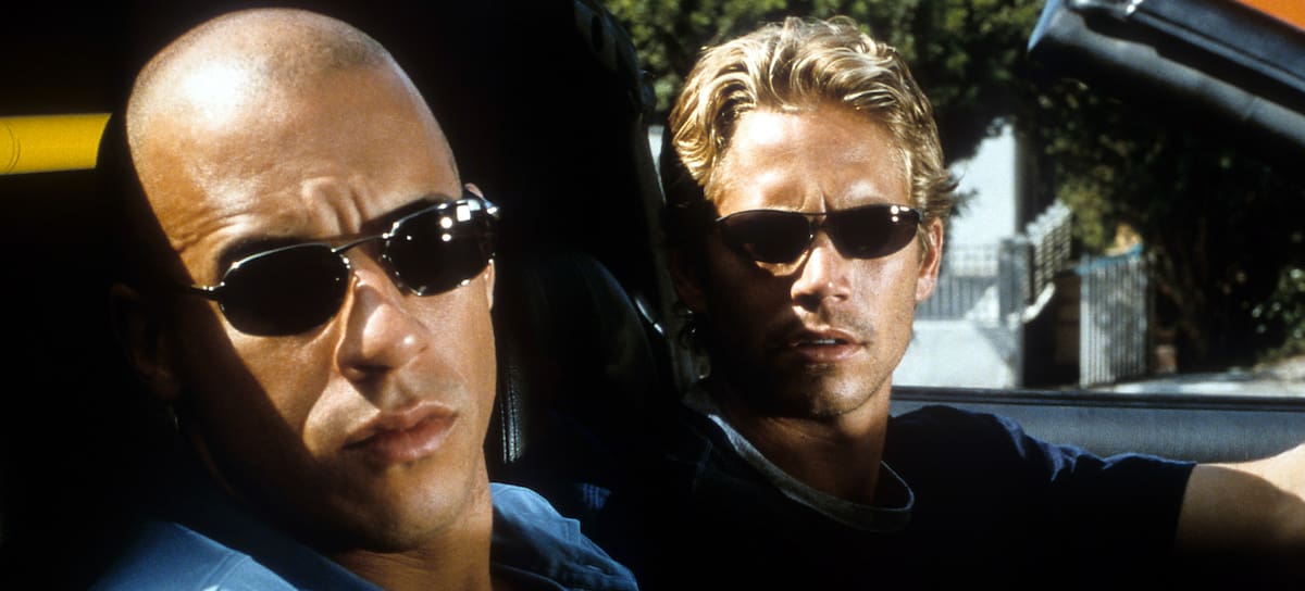 Vin Diesel and Paul Walker looking from car in a scene from the film 'The Fast And The Furious', 2001. (Photo by Universal/Getty Images)