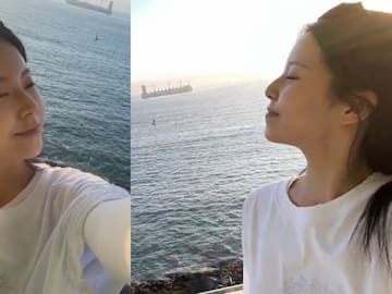 Kyujin disfruta las vistas de su hotel en Chile antes del show de