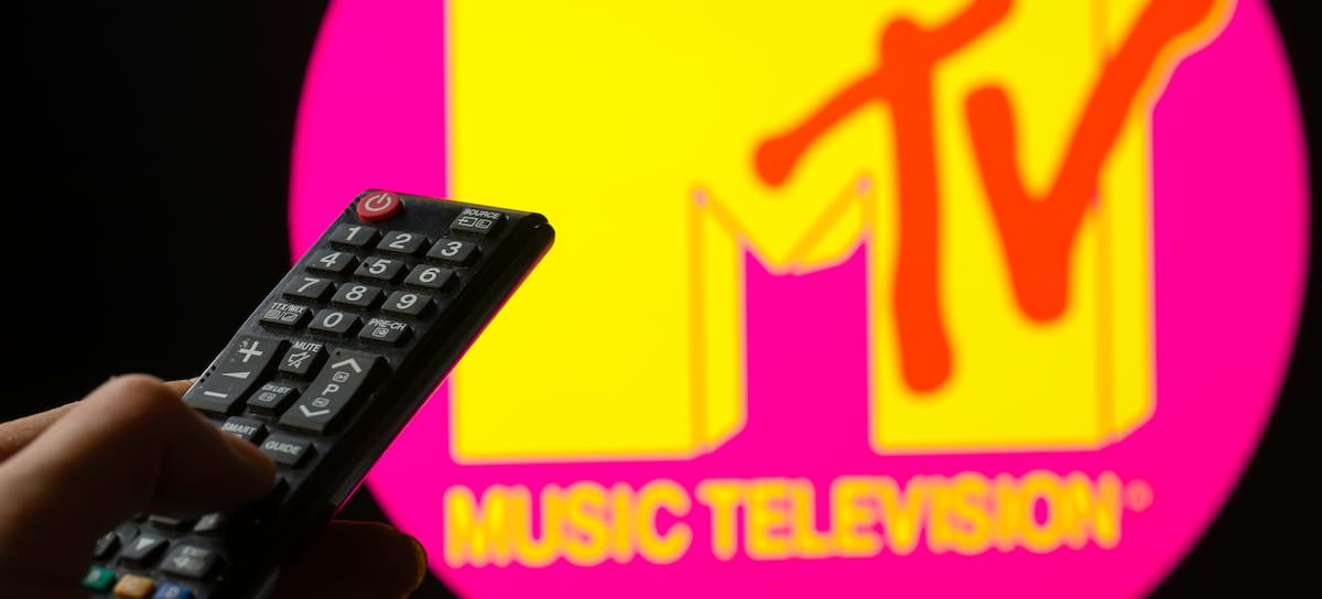 The MTV logo displays on a TV screen with a TV remote. Paramount announces the closure of the MTV channels in this photo illustration in Brussels, Belgium, on December 31, 2025. (Photo by Jonathan Raa/NurPhoto via Getty Images)